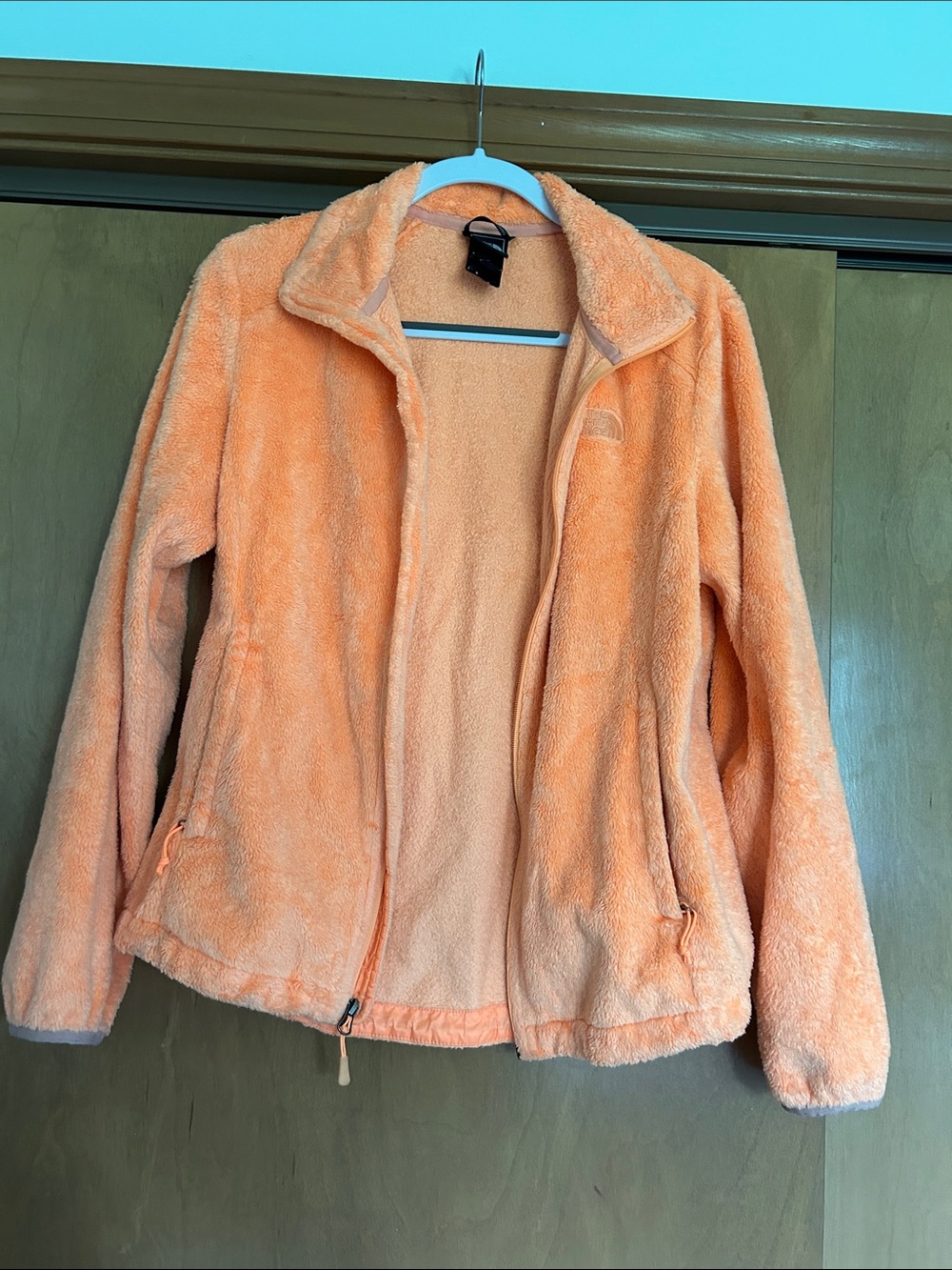 The North Face Women’s Plush Fleece Jacket in Peach Orange